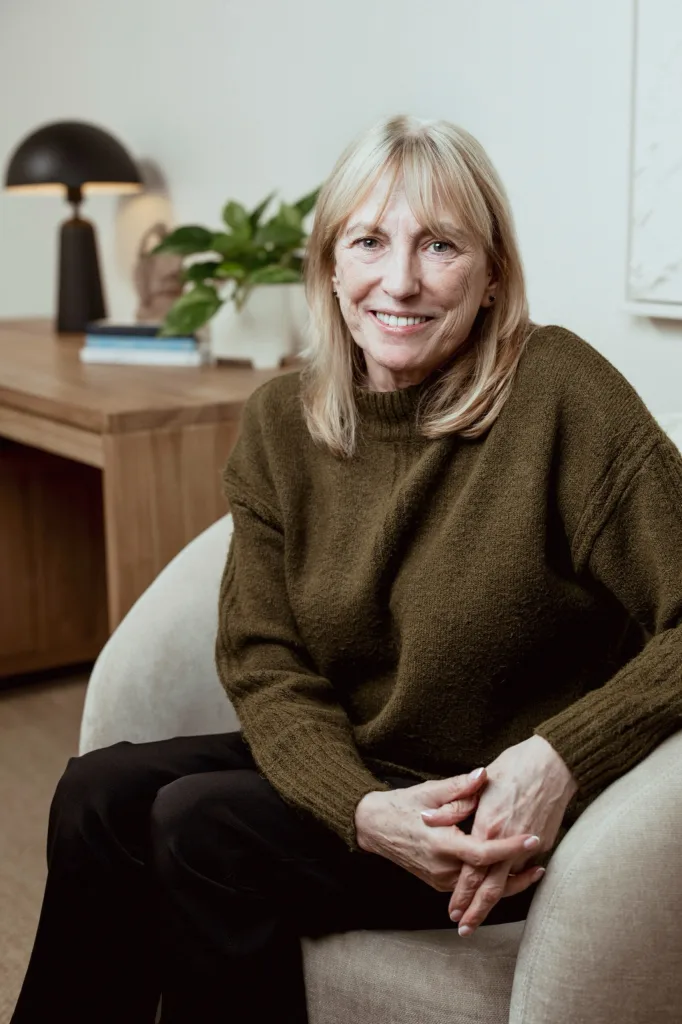 Portrait of Dr Catherine Barton-Sweeney, Counselling Psychologist at London Bridge Therapy, seated in a clinic room