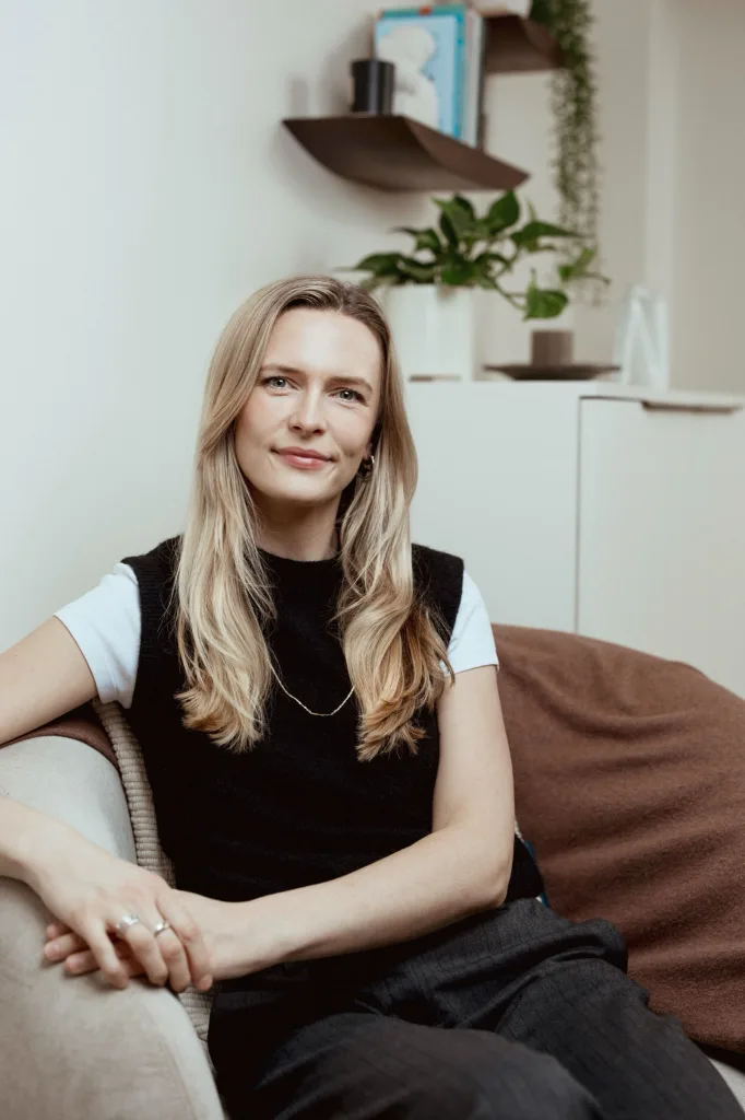 Portrait of Dr Olivia Adamson, Counselling Psychologist at London Bridge Therapy, seated in a consulting room