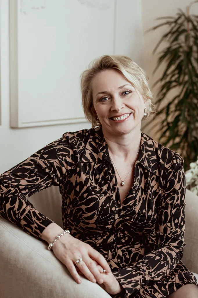 Portrait of Sarah Horner, Specialist Couples Therapist at London Bridge Therapy, seated in a clinic consulting room